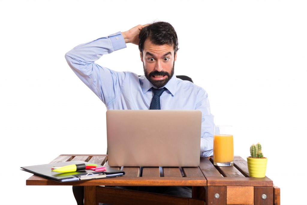 Businessman in his office having problem